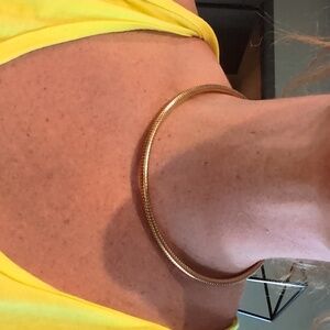 Vintage gold toned choker necklace.